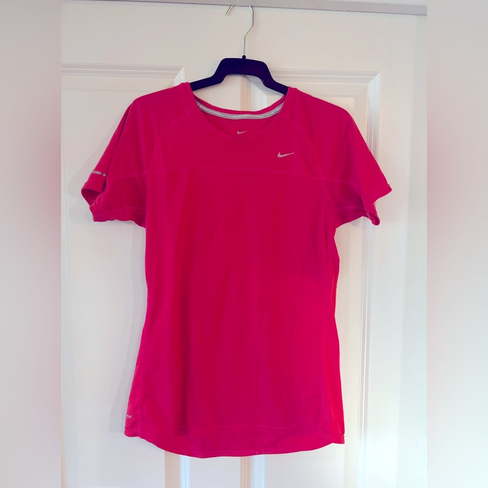 Nike pink/dark salmon Dri-fit T-shirt.